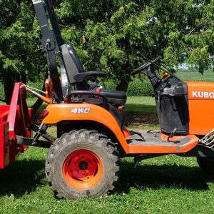 Kubota mounted with a Split-Fire Bucket