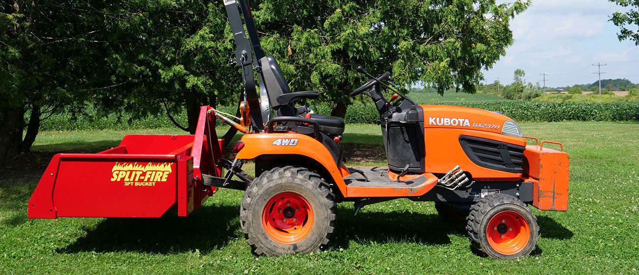 Kubota mounted with a Split-Fire Bucket