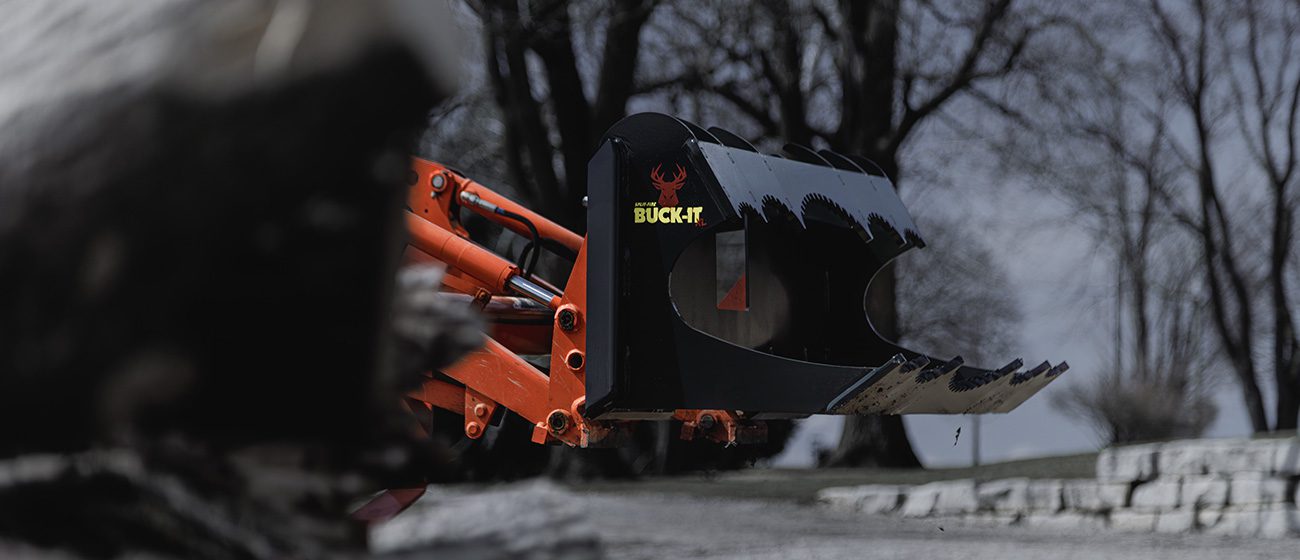 Split-fire Buck-it XL mounted on kubota tractor