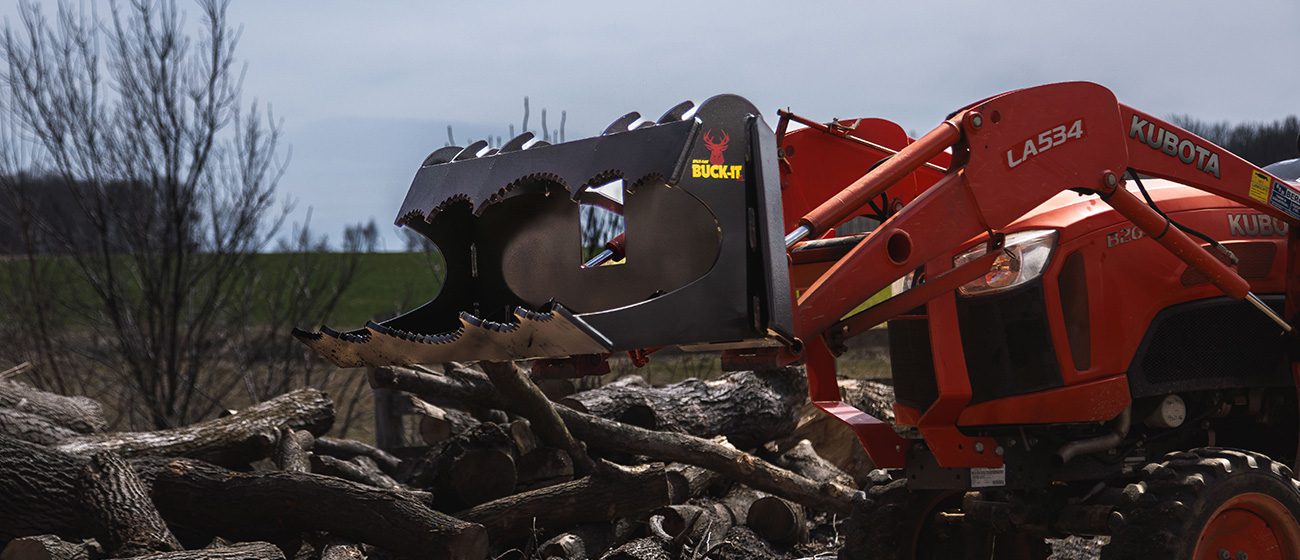 Split-fire Buck-it XL mounted on kubota tractor