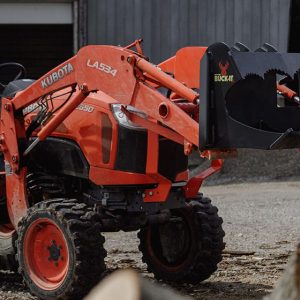 Split-fire Buck-it XL mounted on kubota tractor
