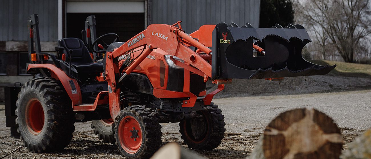 Split-fire Buck-it XL mounted on kubota tractor