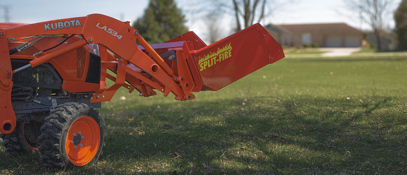 Split-Fire high cap bucket mounted to kubota bx
