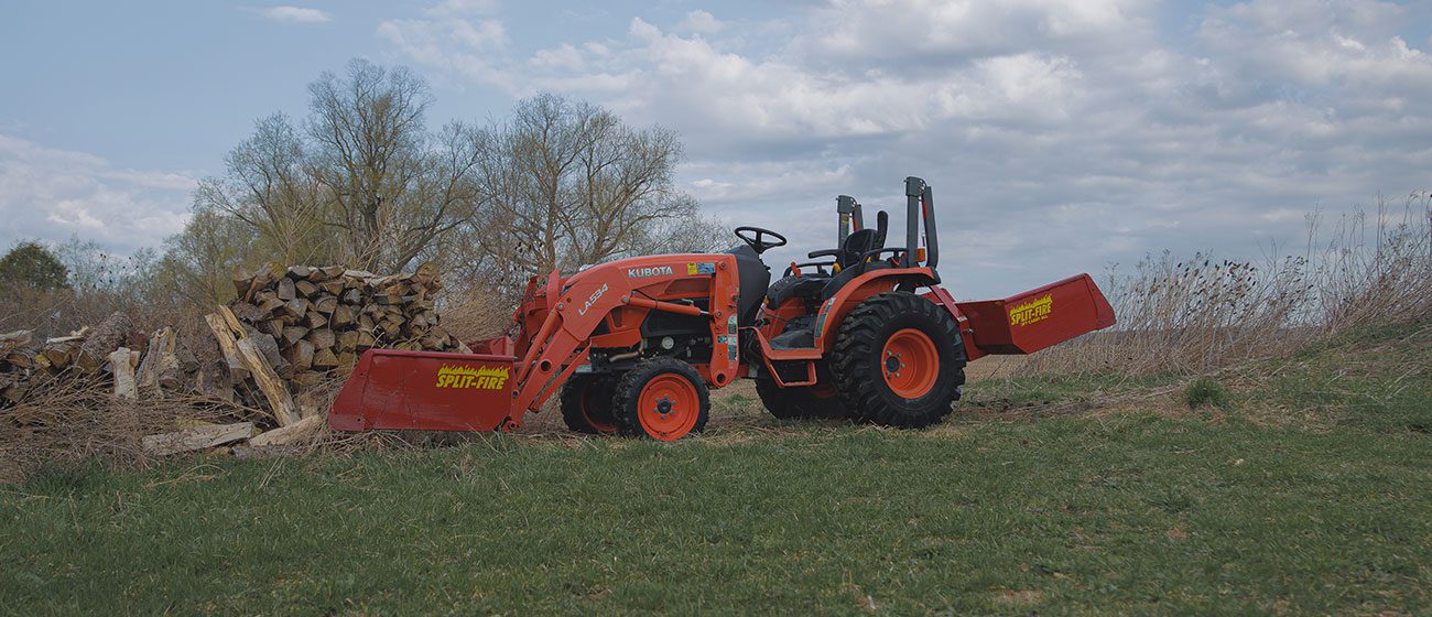 Split-Fire high cap bucket mounted to kubota bx