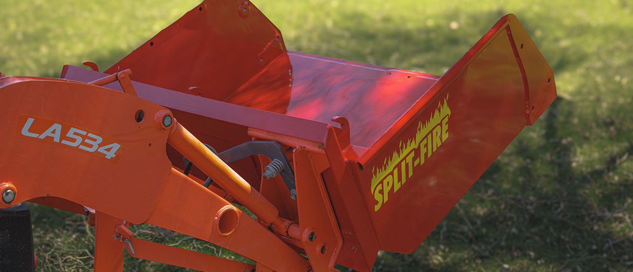 Split-Fire high cap bucket mounted to kubota bx