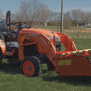Split-Fire high cap bucket mounted to kubota bx with loaded pallets