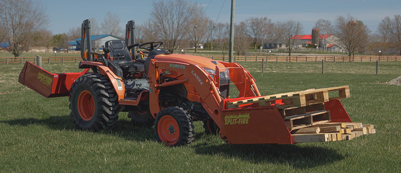 Split-Fire high cap bucket mounted to kubota bx with loaded pallets
